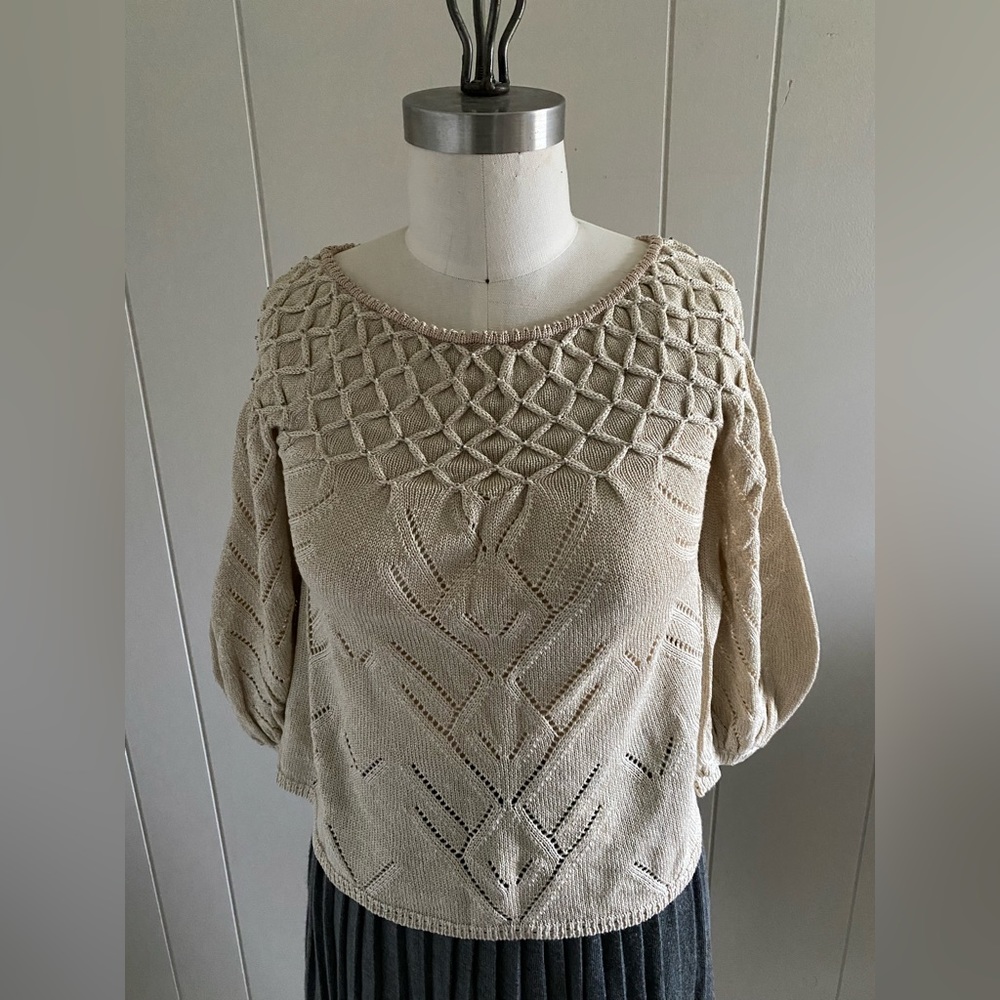 Boho sweater with beaded smocking detail and puff 3/4 sleeve.
